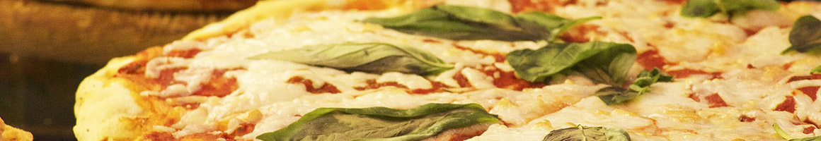 Eating Italian Pizza at Elizabeth's Italian Restaurant Pizzeria restaurant in Kernersville, NC.